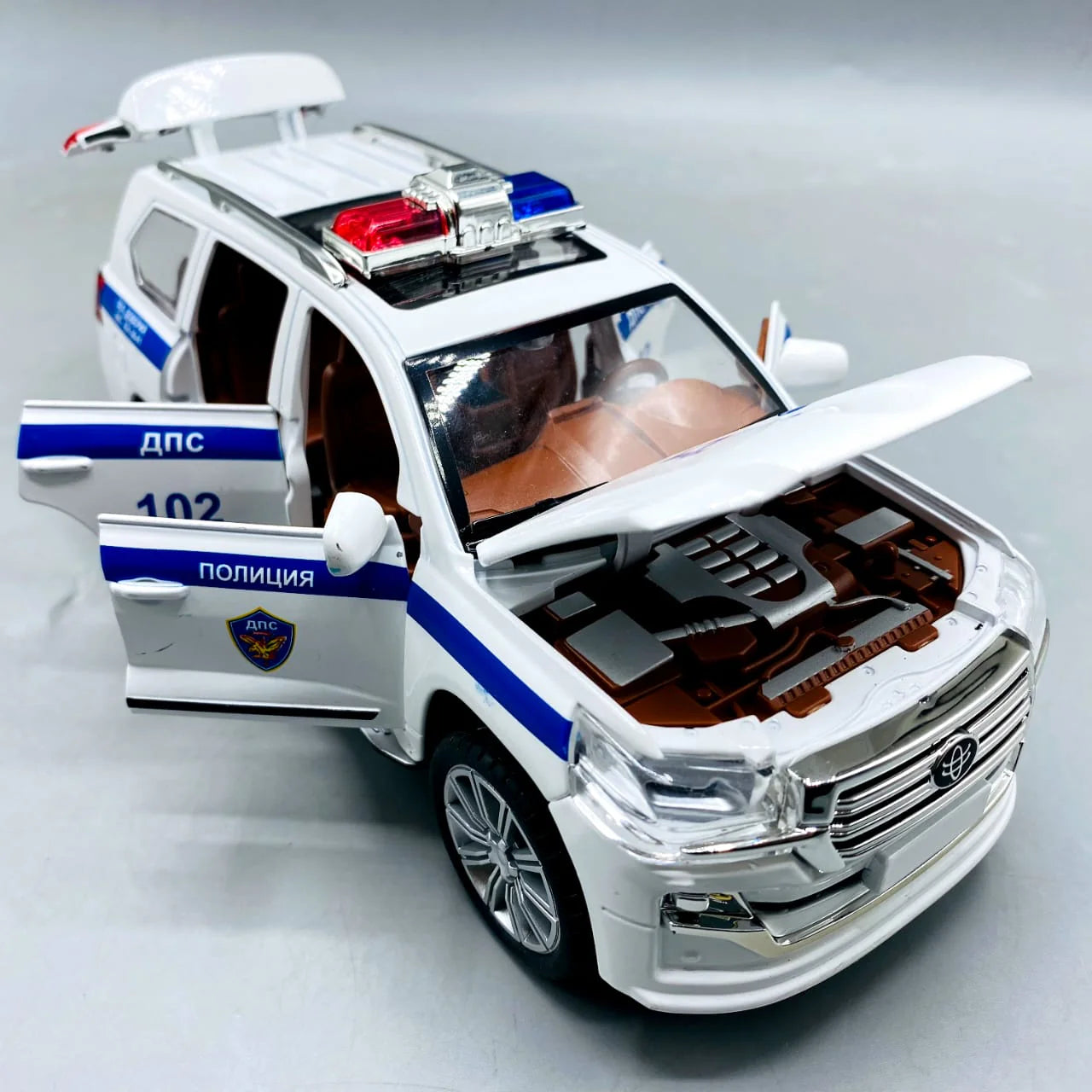 1:24 Scale Toyota Land Cruiser Police Car - Die-Cast Model with Light & Sound