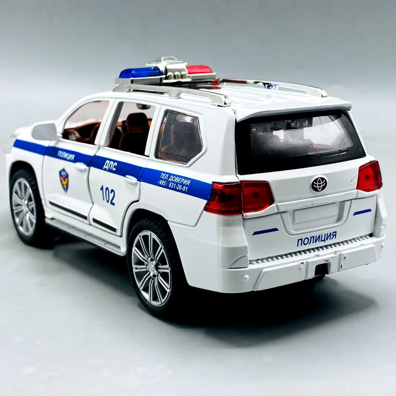 1:24 Scale Toyota Land Cruiser Police Car - Die-Cast Model with Light & Sound