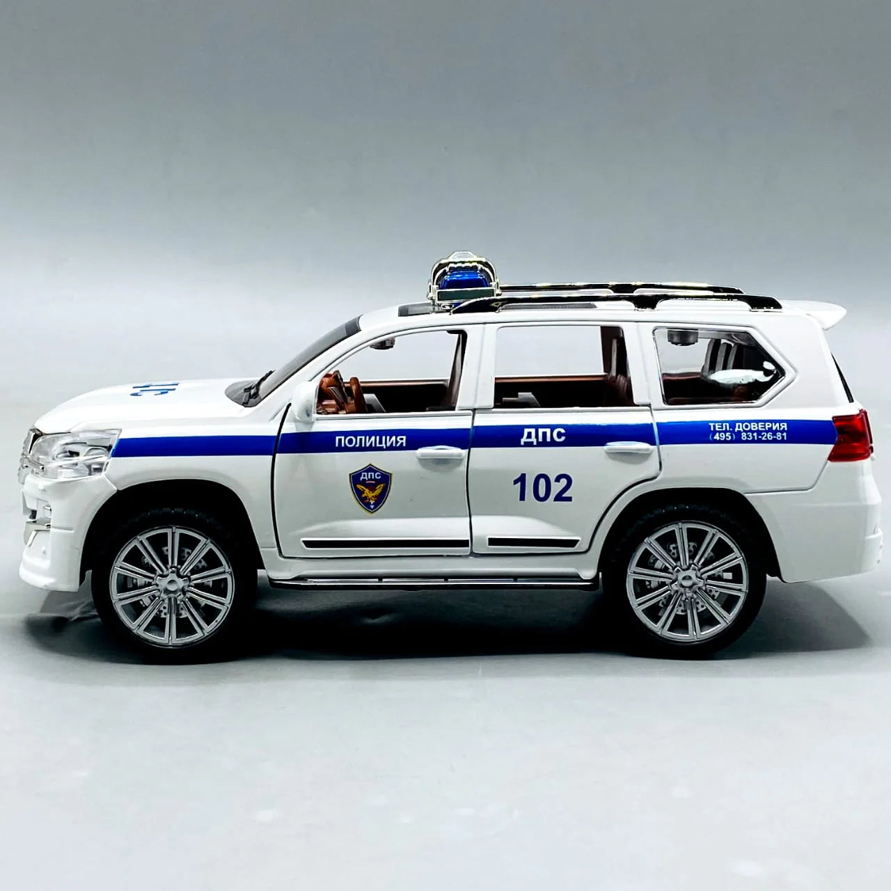 1:24 Scale Toyota Land Cruiser Police Car - Die-Cast Model with Light & Sound