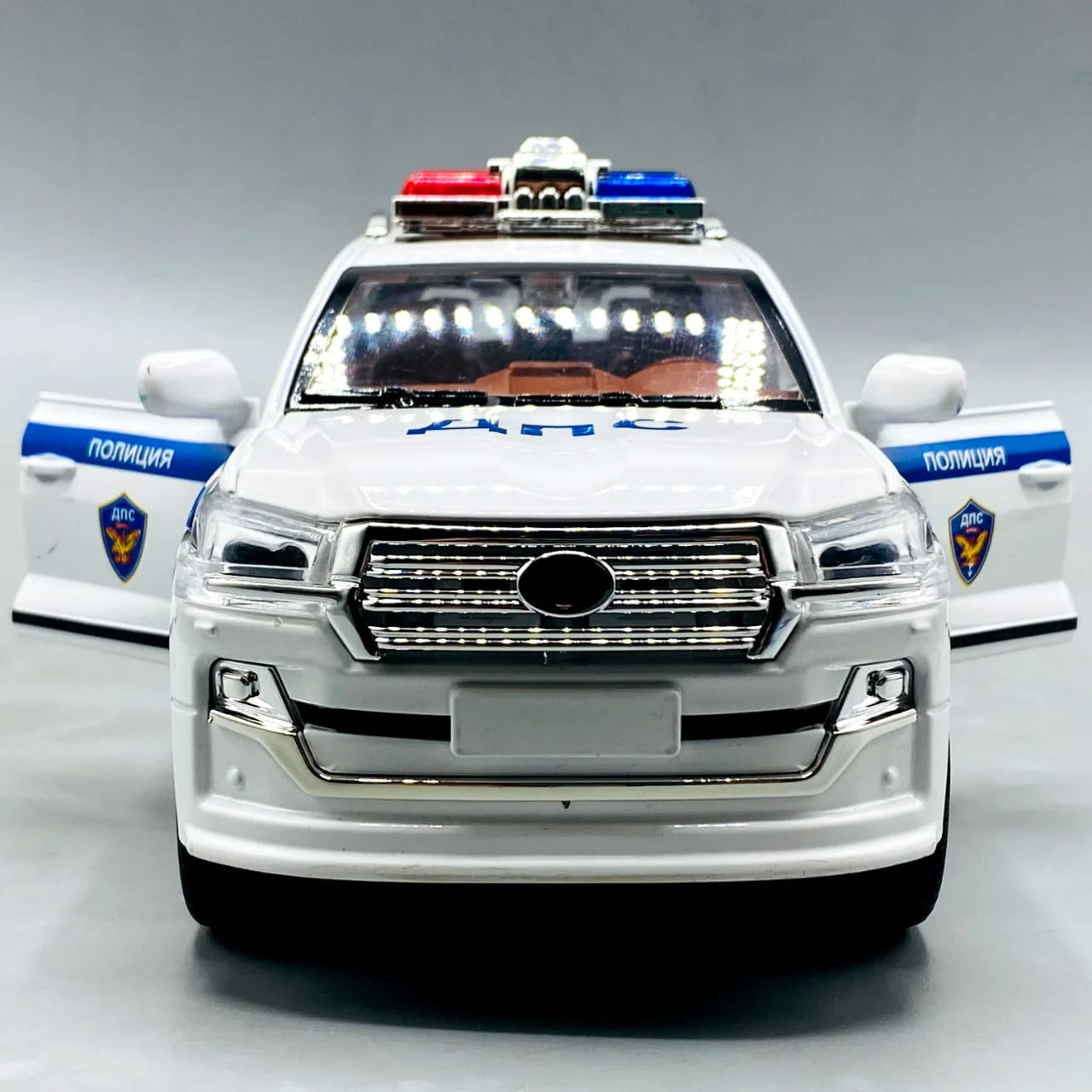 1:24 Scale Toyota Land Cruiser Police Car - Die-Cast Model with Light & Sound